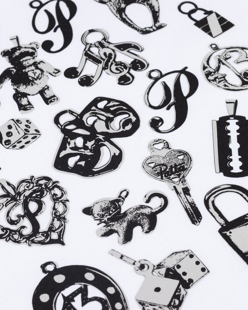 Close-up of black charms graphic print on the white Patta Kids Charm T-Shirt.
