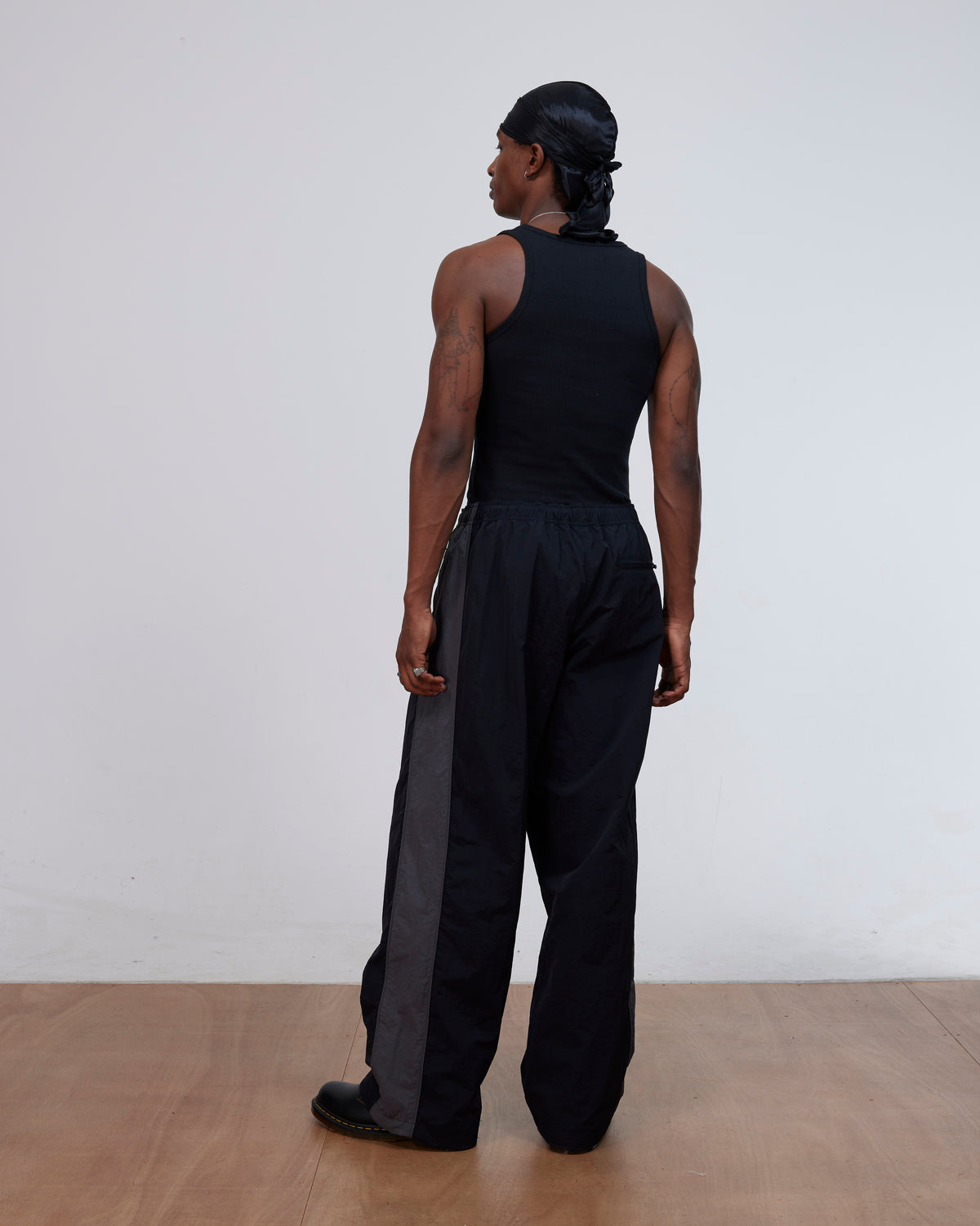 Patta Panelled Oversized Track Pants (Black)