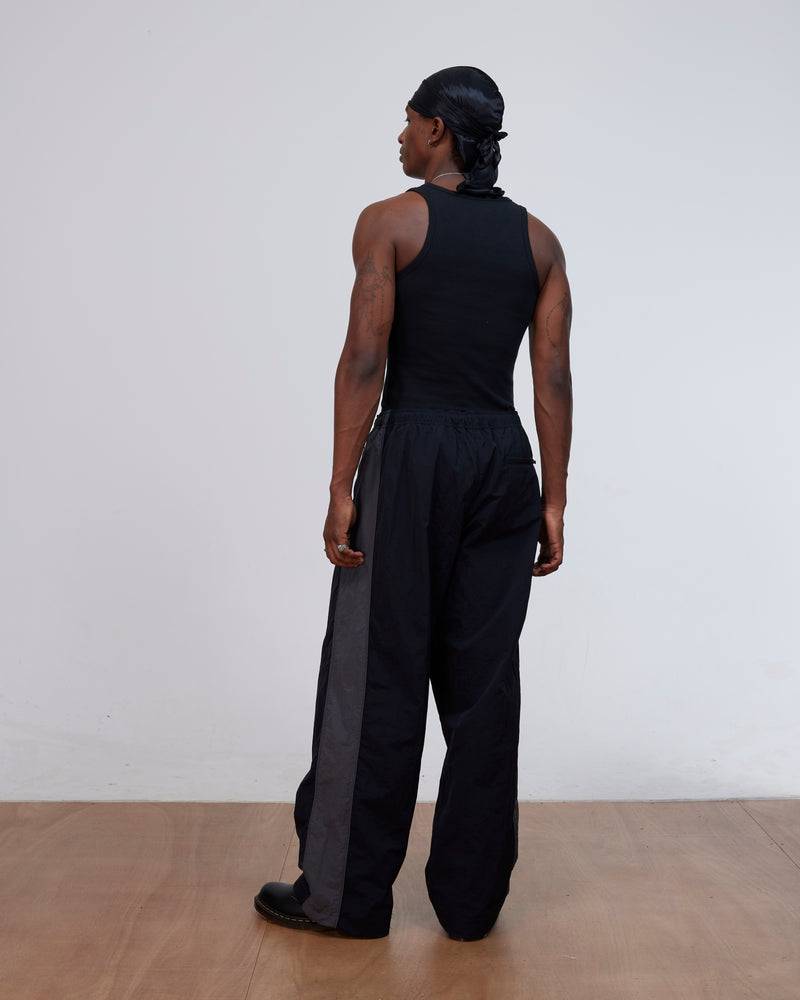 Patta Panelled Oversized Track Pants (Black)
